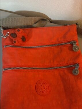 Kipling Bright Orange Nylon Crossbody with Beige Strap